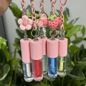 Llavero portátil Lápiz labial líquido Llavero Brillo <span class=keywords><strong>de</strong></span> labios Hidratante <span class=keywords><strong>de</strong></span> larga duración Mancha <span class=keywords><strong>de</strong></span> labios Niños Sabor <span class=keywords><strong>de</strong></span> frutas Maquillaje <span class=keywords><strong>de</strong></span> belleza - Product Image 5
