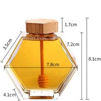 Bouteille de miel en verre hexagonal unique de luxe 100 ml/220 ml/380 ml, fournisseurs de bocaux avec couvercle en bois utilisés pour la confiture de pudding au miel