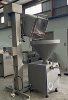 Élévateur de bacs de benne basculante de palan de seau de matériel hydraulique de l'acier inoxydable 200L dans l'ascenseur d'ascenseur de viande de machine de ligne de traitement