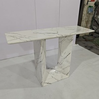 Table à manger rectangulaire effet marbre blanc avec base trapézoïdale