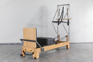 เครื่องพิลาทิสอเนกประสงค์ที่ทนทาน พร้อมเตียงเลื่อนและเตียงแกนกลางสีขาวแบบกึ่งยกสูง  พร้อมอุปกรณ์ทาวเวอร์รีฟอร์เมอร์ไม้ - Product Image 6