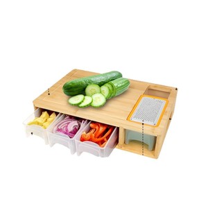C'est une planche à découper en bambou pour la maison avec tiroirs, une planche à découper pour la viande et une planche à découper en bois massif pour trancher. - Product Image 1