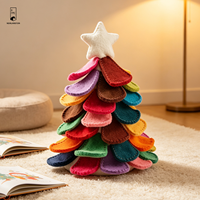 Décoration murale de Noël en feutre patchwork avec étoile superposée colorée et languettes décoratives