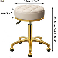 Tabouret ottoman rond de pédicure de salon de beauté en velours rose de style nordique avec base dorée
