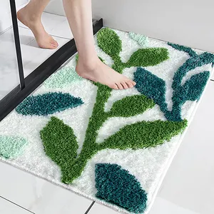 Tappetino da bagno trapuntato in microfibra super assorbente all'ingrosso a forma di foglie floccaggio tappetino da bagno trapuntato in peluche