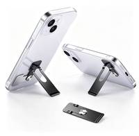 Support de téléphone pliable avec adhésif, ultra-fin, en métal, invisible, à coller sur le bureau, support portable horizontal pour téléphone et tablette
