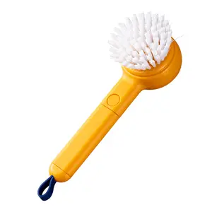 Multi-functional fruit and vegetable brush can be used to hang cleaning products and household brushes
