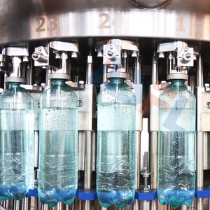 Ligne de machines de lavage, remplissage, bouchage, étiquetage et emballage personnalisée pour bouteilles PET de 450 ml à 1000 ml de boisson <span class=keywords><strong>gazeuse</strong></span> au citron avec dispositif de mélange - Product Image 1