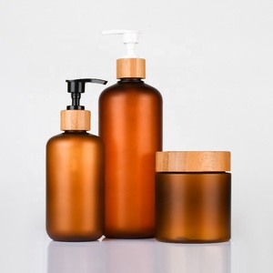 Bamboo skincare packaging set 60ml 120ml 150ml 250ml 500ml amber frosted plastic containers for shampoo
