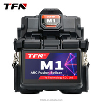 Machine de soudage à fibres optiques TFN M1 TFN Épisseur de fibres optiques FTTH 6S Épissage le plus rapide 15S Chauffage 5200mAh Épisseur de fusion de batterie