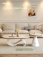 Table basse en pierre à motif ondulé artistique, style français, ton crème, design élégant et créatif pour petits salons