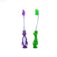 Brosse à dents pour enfants sur le thème des dinosaures pour un usage domestique Poils souples Produit de soins bucco-dentaires amusant pour enfants avec poignée en PP
