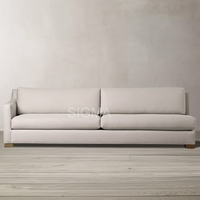 Canapé d'angle de luxe SIGMA - Canapé en tissu adapté aux appartements, idéal pour les centres commerciaux, les hôtels et les espaces familiaux