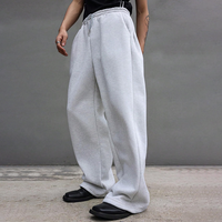 Pantalon de jogging ample pour homme, coupe décontractée, jambe large, taille élastique avec cordon de serrage, poches, bas ouvert, style athlétique
