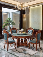 Ensemble table et chaises de salle à manger en marbre noir et or de style européen, nouveau style chinois, en bois massif sculpté, démontable et assemblable pour salles à manger