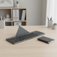 Teclado Bluetooth Plegable Recargable Portátil al por Mayor, Teclado Inalámbrico para Tablet Mint