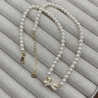 Nouveau collier pendentif rétro en laiton plaqué or avec perle chaîne de corde géométrique à la mode haut de gamme haut de gamme tempérament