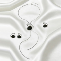 Parure de bijoux fantaisie pour femme, motif spirale irrégulière, plaqué or et argent, avec collier, boucles d'oreilles et bague, en résine noire géométrique, pour soirée