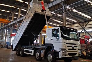 Nuovissimo prezzo a buon mercato SINOTRUK HOWO autocarro con cassone ribaltabile 8x4 12 ruote LHD RHD Dump autocarro nuovo trattore camion in vendita - Product Image 4