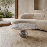 Table basse ronde en marbre rose éléphant naturel avec piétement sculpté bombé, table centrale en pierre pour salon, vente en gros