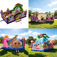 Parc d'attractions gonflable commercial avec toboggans, zones de saut et d'escalade, thème océan, pour enfants, aire de jeux gonflable