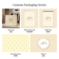 Sac d'emballage cadeau en papier carton/ivoire personnalisé de luxe en matériaux recyclés pour cosmétiques vêtements artisanat papier couché avec logo