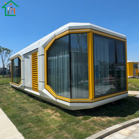 2025 moderne éco-navire Mini espace Capsule maison préfabriquée minuscule maison mobile cabine dirigeable Pod hôtel fait panneau sandwich pour Villa