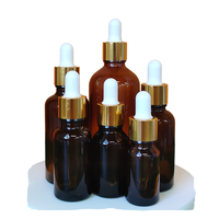 Flacon compte-gouttes en verre ambré avec collier doré et bulbe en caoutchouc blanc, flacon vide pour huile essentielle, sérum, emballage cosmétique