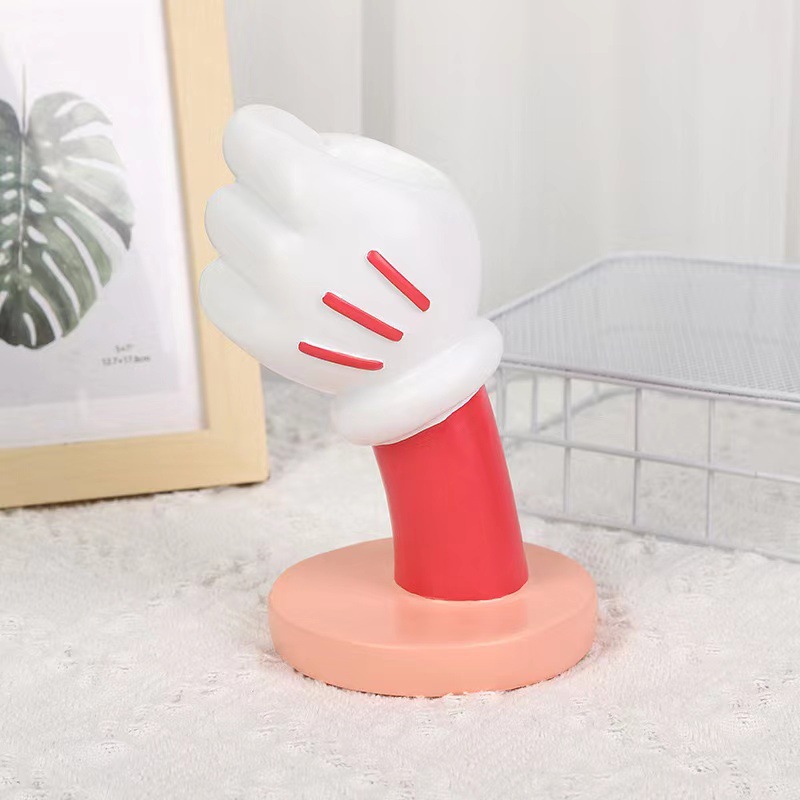 Mickey's hand is pink