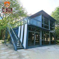 Cbox Maison conteneur modulaire préfabriquée démontable à deux étages avec balcon et fenêtre en verre