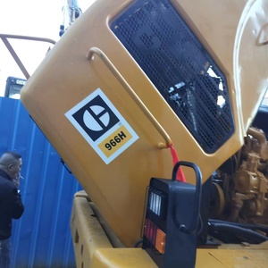 รถตักล้อยาง Caterpillar 966H ขนาด 7 ตัน สีเหลือง บุ้งกี๋มาตรฐาน กำลัง 92 กิโลวัตต์ ปั๊มไฮดรอลิก สำหรับใช้งานในสถานที่ก่อสร้าง - Product Image 5