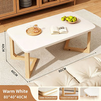 Table basse minimaliste pour salon, pieds en bois, idéale pour petits espaces, table d'appoint pour appartement, location, mobilier de maison