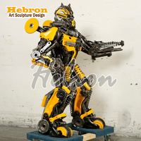 Özel Boyut Büyük Dış Mekan Metal Dev Robot Heykeli LED Işıklı Paslanmaz Çelik Megatron Heykeli
