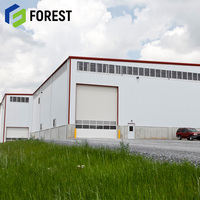 Bâtiment métallique pour entrepôt industriel avec système de structure portique, poutre de grue pour charges lourdes, durabilité