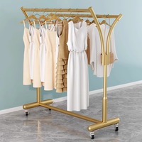 Porte-manteau double simple et mobile pour chambre et balcon, support de vêtements en métal sur pied avec fonction de suspension