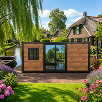 Maison conteneur préfabriquée pliable à double aile de 10 pieds en panneaux sandwich d'acier pour logement d'appoint et suite d'hôtes
