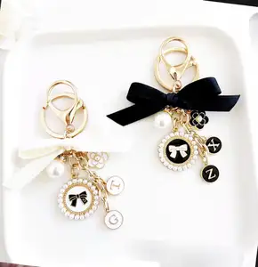 2024 Fashion Gold Plated Key Chain with Bow Design and Pearl Beads Ornamentation for Lady Women's gift