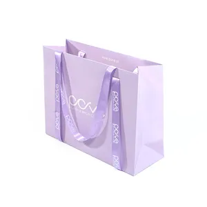 Bolsa de papel de lujo con logotipo personalizado impreso, con asa de cinta, bolsas de embalaje de regalo para negocios pequeños