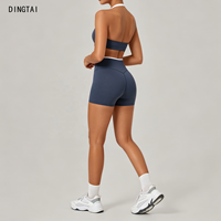 Ensemble de yoga deux pièces color block avec haut dos nu sans manches à coussinets amovibles et short taille haute à bordure contrastante pour l'extérieur