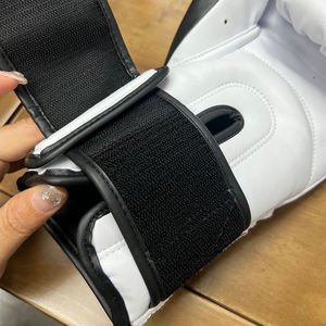 Guantes de entrenamiento profesional de alta calidad MMA Muay Thai Sparring Guantes de boxeo de cuero PU para artes marciales - Product Image 6