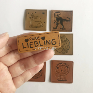 Индивидуальные нашивки из искусственной кожи с тисненым или рельефным логотипом, пришивные или термоклеевые, с люверсами для одежды - Product Image 2