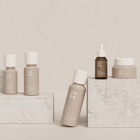 Emballage cosmétique de luxe de 50ml pour soins de la peau Flacon compte-gouttes en plastique de revêtement unique UV or argent avec pipette en plastique pour shampooing
