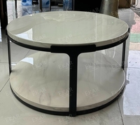Table basse ronde moderne avec cadre en métal pour salon