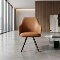 Fauteuil de négociation moderne en cuir brun clair avec pieds coniques en métal noir élégant pour bureau de luxe ou salon