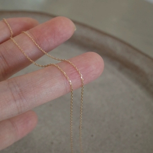 Collana FY-N021 alla Moda per Donna, Catena Invisibile in Argento 925 Placcato Oro 14K, Versatile ed Elegante con Ciondolo Sottile - Product Image 3