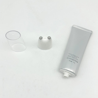 Tube cosmétique ovale pour soins de la peau, tube de crème pour le cou avec deux billelettes massantes