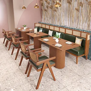 Light luxury card seat custom woven rattan dining chairs restaurant modern simple leaning wall cafe table and chair combination