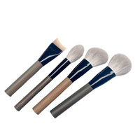 Ensemble de pinceaux de maquillage de luxe 11 pièces en poils de chèvre et de renard des neiges, doux et naturels, avec manche en bois de santal vert, marque privée