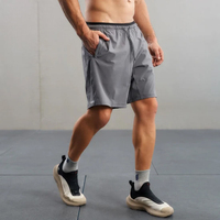 Shorts de sport de compression athlétiques pour hommes avec logo, séchage rapide, en maille respirante, taille mi-haute, avec poches