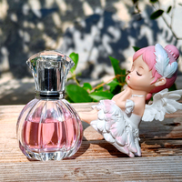 Flacon de parfum en verre transparent de 50 ml, forme cylindrique, col fileté de 15 mm, gravure personnalisée, design unique, avec emballage boîte.